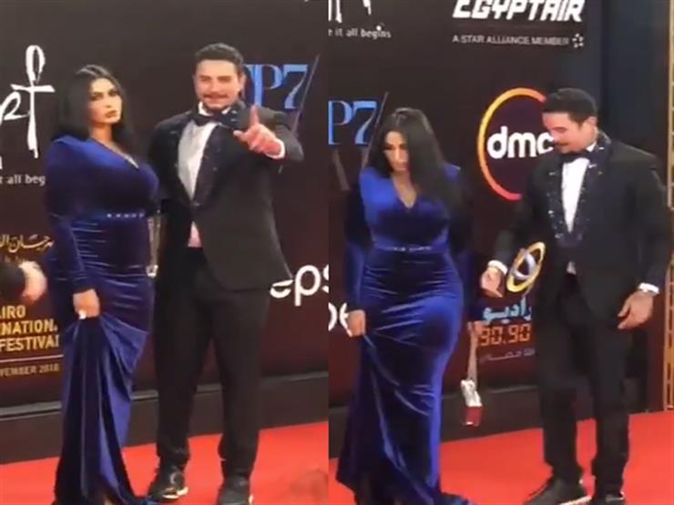 بالفيديو.. أحمد الفيشاوي وزوجته يخطفان الأضواء في مهرجان القاهرة السينمائي