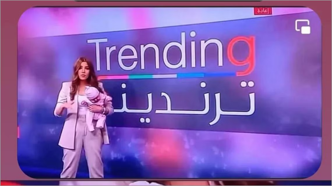 إعلامية سورية تحمل ابنتها على الهواء في بي بي سي